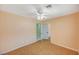 Bedroom features wood-look floors, ceiling fan, and ensuite bath at 111 Narcissus Ln, Las Vegas, NV 89107