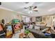 Spacious living room with open layout, tile floors, comfortable seating, and ample natural light at 111 Narcissus Ln, Las Vegas, NV 89107
