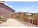 Cozy balcony with wrought-iron railing, perfect for relaxing and enjoying the neighborhood views at 11274 Civita St, Las Vegas, NV 89141