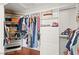 Spacious closet with custom shelving, drawers, and hanging rods for optimal storage at 11274 Civita St, Las Vegas, NV 89141