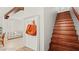 Inviting foyer with a coat rack and a staircase leading to the upper level at 11274 Civita St, Las Vegas, NV 89141