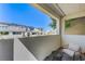 Charming balcony providing a comfortable seating area and views of the surrounding landscape at 11402 Ethereal Landing Ave, Las Vegas, NV 89138
