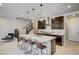 Stylish kitchen with a large center island, pendant lighting, and stainless steel appliances at 11402 Ethereal Landing Ave, Las Vegas, NV 89138