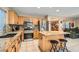 Well-equipped kitchen featuring stainless steel appliances, a central island, and ample counter space at 1325 Baychester Dr, Henderson, NV 89002