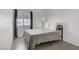 Neutral bedroom with hardwood floors, minimalist decor, and ample natural light at 1428 Daybreak Dr, Las Vegas, NV 89108