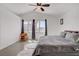 Primary bedroom with vaulted ceilings and large windows provides ample natural light at 1428 Daybreak Dr, Las Vegas, NV 89108