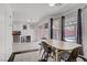 The dining area is conveniently located next to the kitchen and offers outdoor access at 1428 Daybreak Dr, Las Vegas, NV 89108