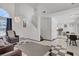 The living room transitions seamlessly to the kitchen and dining areas, perfect for modern living at 1428 Daybreak Dr, Las Vegas, NV 89108