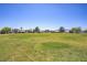 Green field in the park with the surrounding neighborhood in the background at 1428 Daybreak Dr, Las Vegas, NV 89108