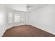 Spacious bedroom with carpet and a ceiling fan, featuring bright natural light at 170 Dove St, Pahrump, NV 89060