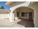 Inviting front porch with stucco columns and decorative window boxes at 170 Dove St, Pahrump, NV 89060