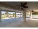 Large covered patio with ceiling fans and ample space for outdoor living and entertaining at 170 Dove St, Pahrump, NV 89060
