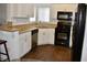 Kitchen with stainless steel dishwasher and white cabinets at 1830 N Buffalo Dr # 1010, Las Vegas, NV 89128