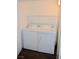 Functional laundry room with a white washer and dryer and ample space at 1830 N Buffalo Dr # 1010, Las Vegas, NV 89128