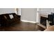 Cozy living room with hardwood floors and fireplace, flooded with natural light at 1830 N Buffalo Dr # 1010, Las Vegas, NV 89128