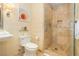 Suite bathroom featuring a vessel sink, modern toilet, and a glass-enclosed marble shower at 2000 Fashion Show Dr # 5022, Las Vegas, NV 89109