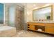 Spacious bathroom with glass shower, double vanity, and marble tile flooring at 2000 Fashion Show Dr # 5022, Las Vegas, NV 89109