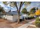 Exterior shot of the community featuring well-maintained landscaping and assigned parking at 2132 Chertsey Dr # B, Las Vegas, NV 89108
