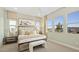 Serene main bedroom with neutral tones, large windows, and a comfortable bed at 214 Piazzetta Pl, Henderson, NV 89011