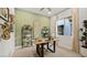 Well-lit home office featuring a desk, shelving, and ample natural light at 214 Piazzetta Pl, Henderson, NV 89011