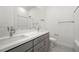 Bathroom featuring double sinks, a spacious vanity, and tile flooring, with a toilet and shower at 218 Piazzetta Pl, Henderson, NV 89011