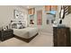 Bedroom featuring golf art, a comfortable bed, dresser, and a night stand at 227 Paraggi Bay Dr, Henderson, NV 89011