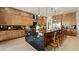 Modern kitchen with stainless steel appliances, large center island and seating at 227 Paraggi Bay Dr, Henderson, NV 89011