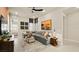 Comfortable living room with a large gray sofa and neutral decor at 227 Paraggi Bay Dr, Henderson, NV 89011
