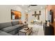 Comfortable living room with a gray sofa and Gathering themed decor at 227 Paraggi Bay Dr, Henderson, NV 89011