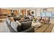 Expansive living room featuring an open layout, stylish furnishings, and seamless flow into the kitchen at 227 Paraggi Bay Dr, Henderson, NV 89011