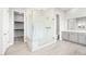 Modern bathroom featuring a glass walk-in shower and double vanity sinks at 241 Paraggi Bay Dr, Henderson, NV 89011