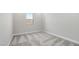 Neutral-colored bedroom with carpet and a window for natural light at 241 Paraggi Bay Dr, Henderson, NV 89011
