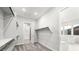 Walk-in closet with shelving and hanging rods, plus access to the bathroom at 241 Paraggi Bay Dr, Henderson, NV 89011