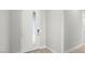 Modern entryway with a stylish front door, neutral paint, and wood-look floors at 241 Paraggi Bay Dr, Henderson, NV 89011