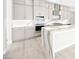 The kitchen boasts stainless steel appliances, a large island, and custom cabinetry at 241 Paraggi Bay Dr, Henderson, NV 89011