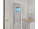 Clean bathroom with a vanity and mirror, tile floors, and a window at 2935 Hardin Dr, Henderson, NV 89074