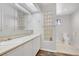 Well-lit bathroom featuring double sinks, modern tile, and plenty of storage at 2935 Hardin Dr, Henderson, NV 89074