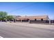 Charming single-story home featuring desert landscaping, a secure fence, and a tile roof at 2935 Hardin Dr, Henderson, NV 89074
