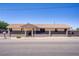 Charming single-story home featuring a low-walled front yard with a secure metal gate and classic desert landscaping at 2935 Hardin Dr, Henderson, NV 89074