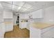 Clean, updated kitchen featuring white cabinetry and essential appliances at 2935 Hardin Dr, Henderson, NV 89074
