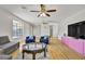Spacious living room featuring wood floors and contemporary furnishings at 2935 Hardin Dr, Henderson, NV 89074