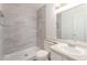 Bathroom features a single sink vanity and tiled walk-in shower at 3151 Soaring Gulls Dr # 2180, Las Vegas, NV 89128