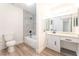 Bathroom with new grey tile in shower and new vanity at 3151 Soaring Gulls Dr # 2180, Las Vegas, NV 89128