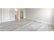 Spacious bedroom with grey flooring and ensuite access at 3151 Soaring Gulls Dr # 2180, Las Vegas, NV 89128