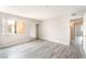 Bright bedroom with new flooring, closet, and neutral paint at 3151 Soaring Gulls Dr # 2180, Las Vegas, NV 89128