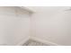 Walk-in closet with white walls, base molding, and clothing rods at 3151 Soaring Gulls Dr # 2180, Las Vegas, NV 89128