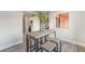 Comfortable dining space with a table, seating for four, and a view of the living room, offering a cozy atmosphere at 3151 Soaring Gulls Dr # 2180, Las Vegas, NV 89128