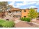 A well-maintained exterior featuring balconies and mature landscaping at 3151 Soaring Gulls Dr # 2180, Las Vegas, NV 89128