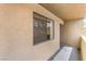 Exterior view showcasing the covered walkway and neutral stucco at 3151 Soaring Gulls Dr # 2180, Las Vegas, NV 89128