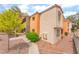 Charming exterior showing the building's architectural style and exterior landscaping at 3151 Soaring Gulls Dr # 2180, Las Vegas, NV 89128